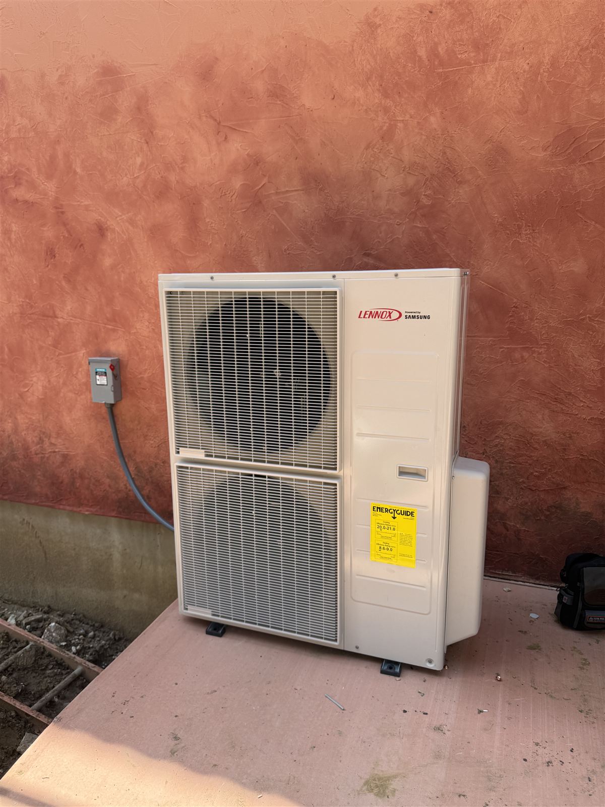 High-efficiency Lennox outdoor condenser unit serving the Tormenta equipment spaces