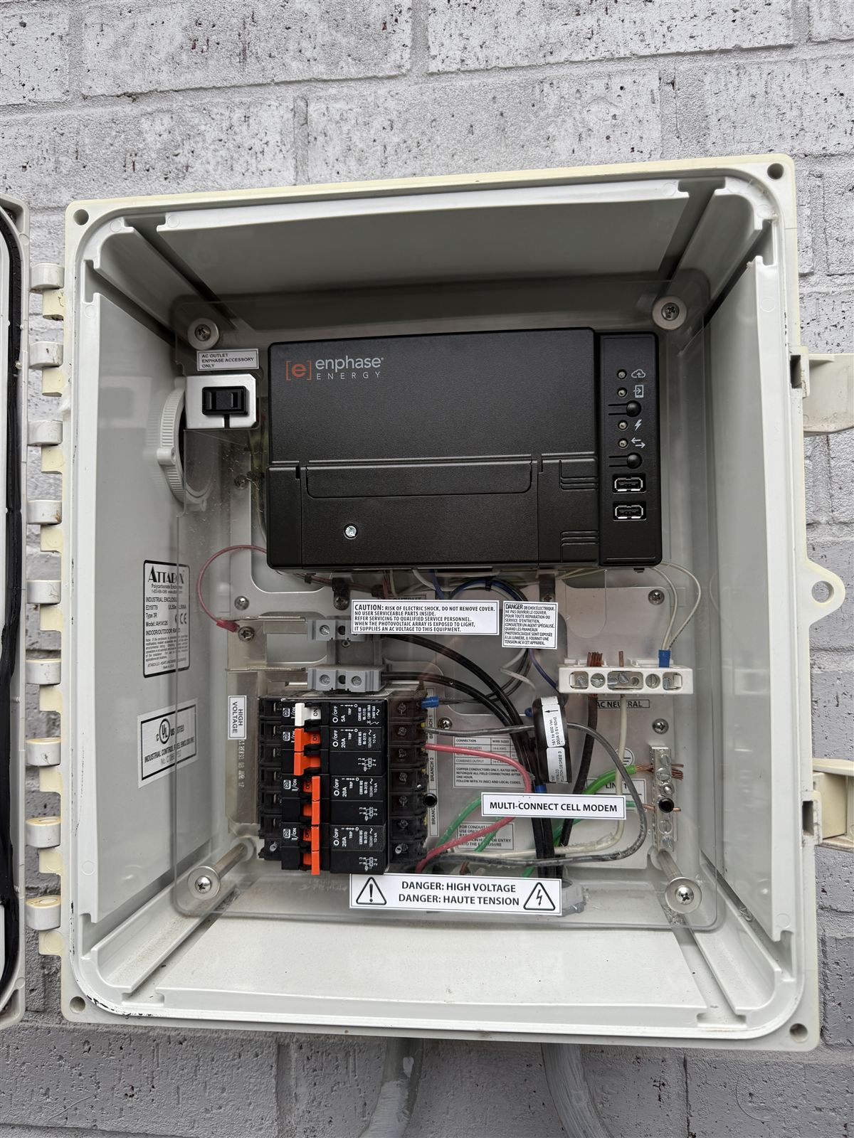 Enphase gateway and control enclosure with cell modem and breakers, commissioned and labeled